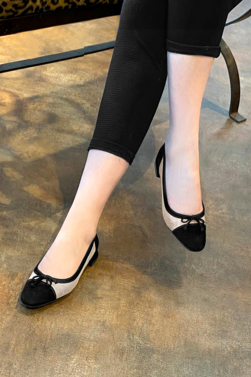 Matt black and natural beige women's ballet pumps, with low heels. Square toe. Flat flare heels. Worn view - Florence KOOIJMAN